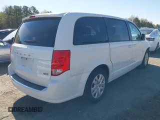 2016 Dodge Grand Caravan SE with VIN 2C4RDGBG2GR114564, listed as a IAAI auction lot 41838735 with 103,348 mi miles and . Bid and sale history available at DreamBid. Image 4.