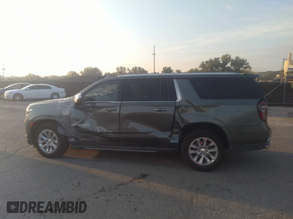 2023 Chevrolet Suburban Premier z VIN 1GNSKFKD8PR305863, wystawiony jako IAAI lot #37536455 z przebiegiem 13 765 mil mil oraz . Historia ofert i sprzedaży dostępna na DreamBid. Obrazek 14.