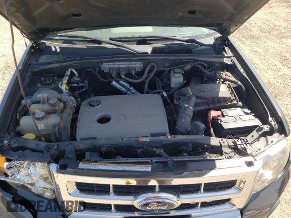 2010 Ford Escape Hybrid z VIN 1FMCU4K32AKB79563, wystawiony jako Copart lot #52892885 z przebiegiem 177 008 mil mil oraz Szkoda całkowita • Salvage title. Historia ofert i sprzedaży dostępna na DreamBid. Obrazek 11.