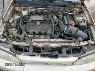 1997 Ford Escort LX with VIN 1FALP13P2VW326223, listed as a Copart auction lot 74509294 with 55,265 mi miles and Salvage Title. Bid and sale history available at carsss.com. Image 13.