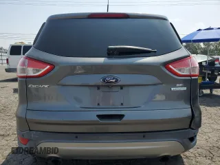 2014 Ford Escape SE z VIN 1FMCU0GX0EUE27453, wystawiony jako Copart lot #59437875 z przebiegiem 154 177 mil mil oraz Czysty tytuł • Clean title. Historia ofert i sprzedaży dostępna na DreamBid. Obrazek 6.