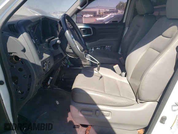 2010 Honda Ridgeline RTL with VIN 5FPYK1F56AB004084, listed as a Copart auction lot 58538224 with 97,558 mi miles and Salvage Title. Bid and sale history available at carsss.com. Image 7.