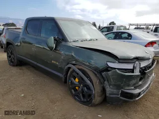 2023 Rivian R1T Adventure with VIN 7FCTGAAA2PN018657, listed as a Copart auction lot 75889434 with 14,342 mi miles and Salvage Title. Bid and sale history available at carsss.com. Image 4.