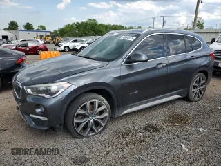 2016 BMW X1 xDrive28i z VIN WBXHT3C31GP881961, wystawiony jako Copart lot #56494955 z przebiegiem Nie podano mil oraz Tytuł czysty. Historia ofert i sprzedaży dostępna na DreamBid. Obrazek 1.