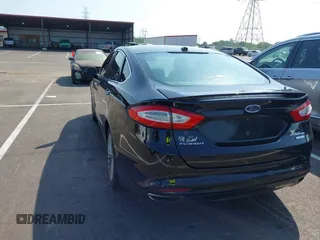 2016 Ford Fusion Titanium with VIN 3FA6P0K90GR333848, listed as a IAAI auction lot 42728138 with 147,864 mi miles and . Bid and sale history available at DreamBid. Image 3.