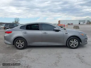 2017 Kia Optima LX with VIN 5XXGT4L39HG134180, listed as a IAAI auction lot 41370144 with 207,442 mi miles. Bid and sale history available at carsss.com. Image 13.