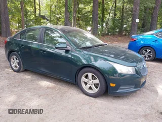 2014 Chevrolet Cruze 1LT with VIN 1G1PC5SB9E7156806, listed as a IAAI auction lot 42813826 with 140,573 mi miles and . Bid and sale history available at DreamBid. Image 1.