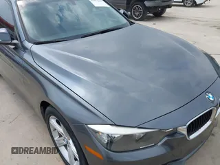 2013 BMW 3 Series 320i with VIN WBA3B1C53DK128602, listed as a IAAI auction lot 41952771 with 103,564 mi miles and . Bid and sale history available at carsss.com. Image 6.