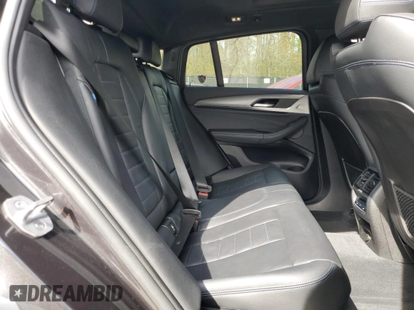 2019 BMW X4 M40i with VIN 5UXUJ5C5XKLJ64004, listed as a Copart auction lot 52106895 with 74,599 mi miles and Salvage title. Bid and sale history available at DreamBid. Image 12.