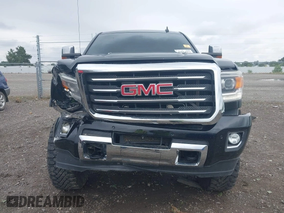 2015 GMC Sierra 2500HD SLT with VIN 1GT12ZE87FF552599, listed as a IAAI auction lot 40054977 with 146,190 mi miles and . Bid and sale history available at DreamBid. Image 11.