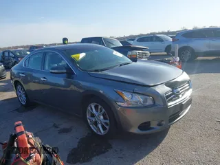 2014 Nissan Maxima 3.5 S with VIN 1N4AA5AP4EC476676, listed as a IAAI auction lot 41853243 with 104,616 mi miles. Bid and sale history available at carsss.com. Image 1.