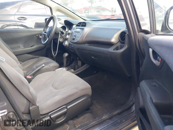2013 Honda Fit with VIN JHMGE8H36DC056640, listed as a IAAI auction lot 41969727 with 94,564 mi miles. Bid and sale history available at carsss.com. Image 5.