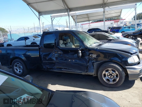 2002 Ford F-150 XL with VIN 1FTRX17WX2NB99454, listed as a IAAI auction lot 41643850 with 180,149 mi miles. Bid and sale history available at carsss.com. Image 13.