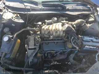 1997 Ford Taurus GL with VIN 1FALP57U2VA153212, listed as a Copart auction lot 75761034 with 167,802 mi miles and Salvage Title. Bid and sale history available at carsss.com. Image 13.