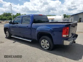 2013 GMC Sierra 1500 SLT with VIN 3GTP2WE77DG161822, listed as a Copart auction lot 63851855 with 169,146 mi miles and Salvage title. Bid and sale history available at DreamBid. Image 2.