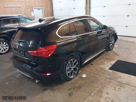 2020 BMW X1 xDrive28i with VIN WBXJG9C07L5P71792, listed as a IAAI auction lot 41583132 with 150,095 mi miles. Bid and sale history available at carsss.com. Image 4.