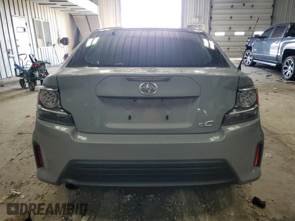 2014 Scion tC z VIN JTKJF5C71E3071683, wystawiony jako Copart lot #50971055 z przebiegiem Nie podano mil oraz Nie do naprawy • Non repairable. Historia ofert i sprzedaży dostępna na DreamBid. Obrazek 6.