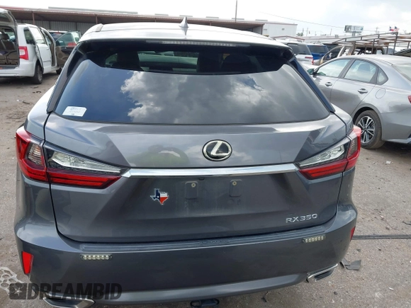 2016 Lexus RX 350 z VIN 2T2ZZMCA4GC032034, wystawiony jako IAAI lot #42095974 z przebiegiem 57 195 mil mil oraz . Historia ofert i sprzedaży dostępna na DreamBid. Obrazek 16.