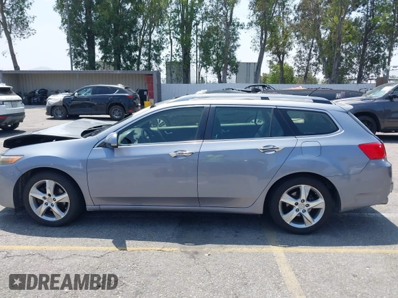 2012 Acura TSX Technology z VIN JH4CW2H67CC003799, wystawiony jako IAAI lot #42171355 z przebiegiem 124 184 mil mil oraz . Historia ofert i sprzedaży dostępna na DreamBid. Obrazek 15.
