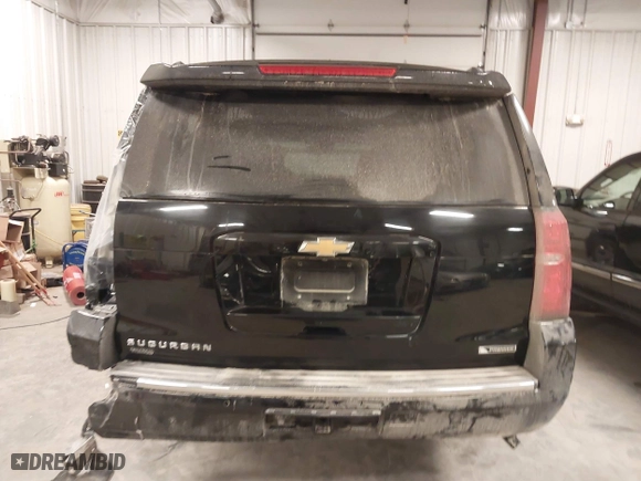 2017 Chevrolet Suburban Premier with VIN 1GNSKJKC0HR250854, listed as a IAAI auction lot 41541476 with 128,231 mi miles. Bid and sale history available at carsss.com. Image 16.