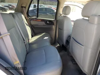 2006 GMC Envoy Denali with VIN 1GKET63M762190296, listed as a Copart auction lot 46691595 with 128,985 mi miles and Salvage Title. Bid and sale history available at carsss.com. Image 10.