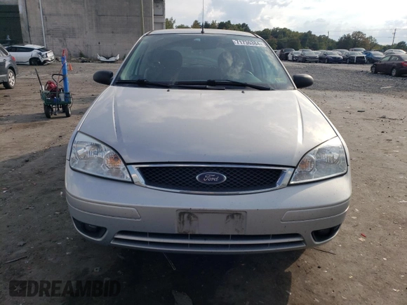 2007 Ford Focus S with VIN 1FAHP37N67W268162, listed as a Copart auction lot 71736384 with 69,391 mi miles and Salvage Title. Bid and sale history available at DreamBid. Image 5.