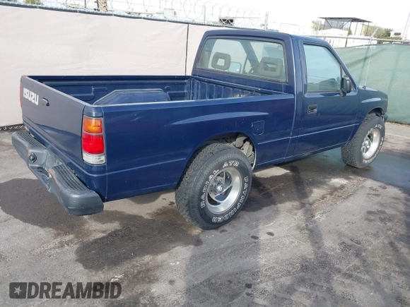 1993 Isuzu Pickup S z VIN 4S1CL11L7P4207354, wystawiony jako IAAI lot #41237021 z przebiegiem 192 502 mil mil oraz . Historia ofert i sprzedaży dostępna na DreamBid. Obrazek 4.