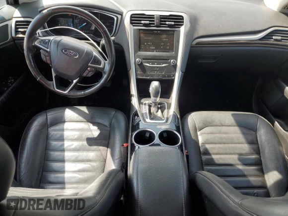 2013 Ford Fusion SE Hybrid z VIN 3FA6P0LU3DR336838, wystawiony jako Copart lot #56205445 z przebiegiem 209 164 mil mil oraz Czysty tytuł • Clean title. Historia ofert i sprzedaży dostępna na DreamBid. Obrazek 8.