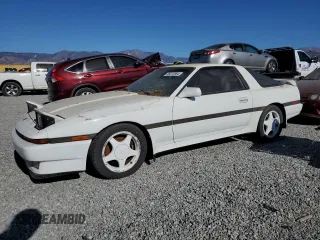 1987 Toyota Supra z VIN JT2MA7018H0045533, wystawiony jako Copart lot #85372884 z przebiegiem 294 117 mil mil oraz Szkoda całkowita • Salvage title. Historia ofert i sprzedaży dostępna na DreamBid. Obrazek 1.