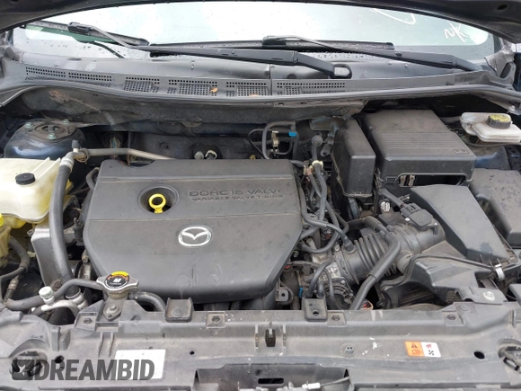 2014 Mazda 5 Sport with VIN JM1CW2BL6E0169672, listed as a IAAI auction lot 42422459 with 212,179 mi miles and . Bid and sale history available at DreamBid. Image 10.
