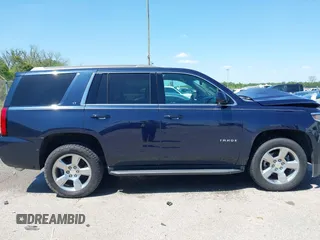 2018 Chevrolet Tahoe LT with VIN 1GNSCBKC0JR138385, listed as a IAAI auction lot 41977300 with 104,987 mi miles and . Bid and sale history available at DreamBid. Image 13.