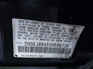 1997 Honda Civic EX with VIN 2HGEJ8645VH566736, listed as a IAAI auction lot 41876647 with 277,968 mi miles. Bid and sale history available at carsss.com. Image 9.