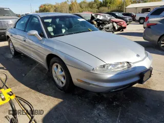 1999 Oldsmobile Aurora with VIN 1G3GR62C7X4109461, listed as a Copart auction lot 75916764 with 107,690 mi miles and Salvage Title. Bid and sale history available at DreamBid. Image 4.