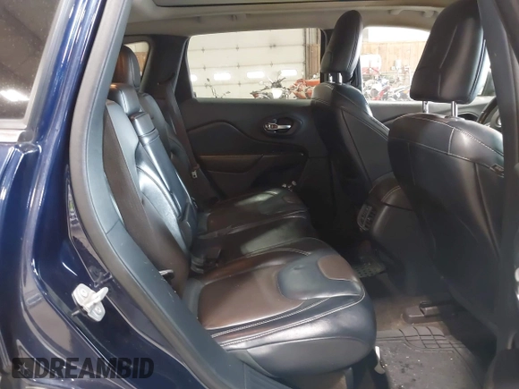 2015 Jeep Cherokee Limited with VIN 1C4PJMDB4FW775065, listed as a IAAI auction lot 42044247 with 125,131 mi miles and . Bid and sale history available at DreamBid. Image 8.