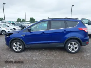 2013 Ford Escape SE with VIN 1FMCU9GX1DUD83174, listed as a IAAI auction lot 42509186 with 164,584 mi miles and . Bid and sale history available at DreamBid. Image 14.