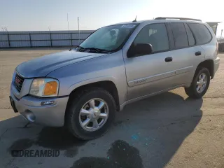 2005 GMC Envoy SLE with VIN 1GKDS13SX52157548, listed as a Copart auction lot 41844585 with 70,962 mi miles and Salvage Title. Bid and sale history available at carsss.com. Image 1.