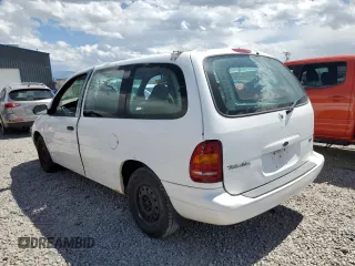 1998 Ford Windstar z VIN 2FTDA54U5WBB50718, wystawiony jako Copart lot #68932174 z przebiegiem 57 879 mil mil oraz Tytuł czysty. Historia ofert i sprzedaży dostępna na DreamBid. Obrazek 2.