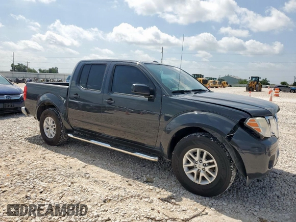 2015 Nissan Frontier SV with VIN 1N6AD0ER7FN728259, listed as a Copart auction lot 65002615 with 133,174 mi miles and Salvage title. Bid and sale history available at DreamBid. Image 4.