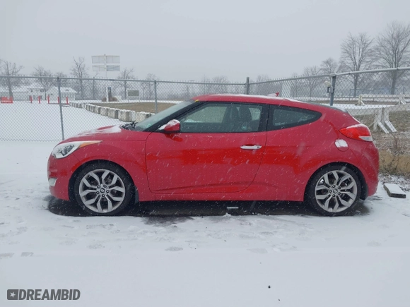 2014 Hyundai Veloster with VIN KMHTC6AD8EU214612, listed as a IAAI auction lot 41258820 with 61,984 mi miles. Bid and sale history available at carsss.com. Image 14.