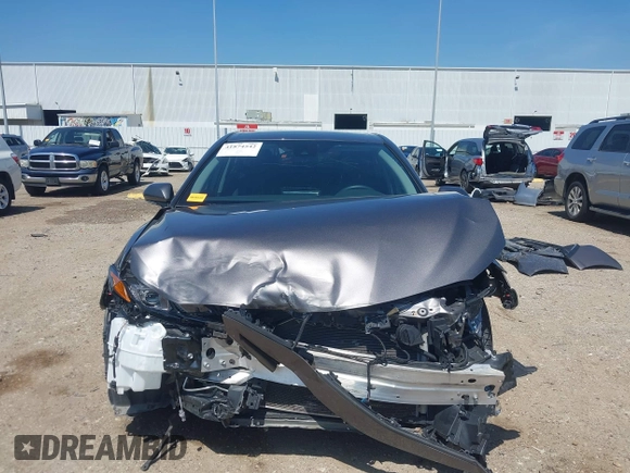 2023 Toyota Camry SE z VIN 4T1G11AK3PU735202, wystawiony jako IAAI lot #41874542 z przebiegiem 54 708 mil mil oraz . Historia ofert i sprzedaży dostępna na DreamBid. Obrazek 13.