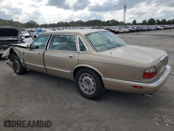 1999 Jaguar XJ z VIN SAJKX6048XC849376, wystawiony jako Copart lot #70538064 z przebiegiem 122 891 mil mil oraz Szkoda całkowita • Salvage title. Historia ofert i sprzedaży dostępna na DreamBid. Obrazek 2.