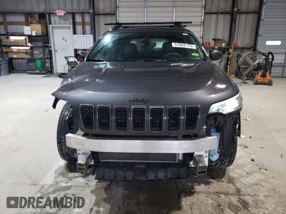 2021 Jeep Cherokee 80th Anniversary with VIN 1C4PJMMX7MD220289, listed as a Copart auction lot 51662175 with 77,109 mi miles and Salvage Title. Bid and sale history available at carsss.com. Image 5.