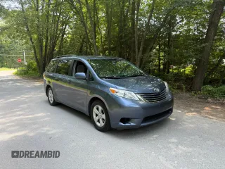 2015 Toyota Sienna LE AAS with VIN 5TDKK3DC1FS623710, listed as a Copart auction lot 62335575 with 221,148 mi miles and Clean title. Bid and sale history available at DreamBid. Image 1.