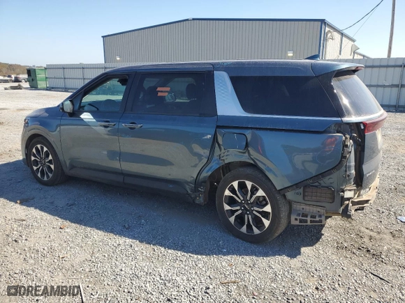 2023 Kia Carnival EX with VIN KNDNC5H34P6225702, listed as a Copart auction lot 76108214 with 50,241 mi miles and Salvage Title. Bid and sale history available at carsss.com. Image 2.