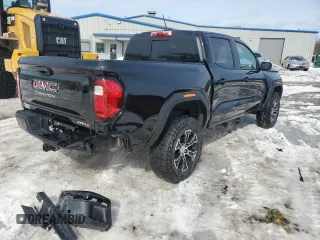 2024 GMC Canyon 4WD AT4 z VIN 1GTP6DEK7R1219298, wystawiony jako Copart lot #46954975 z przebiegiem 5325 mil mil oraz Szkody całkowita. Historia ofert i sprzedaży dostępna na DreamBid. Obrazek 3.