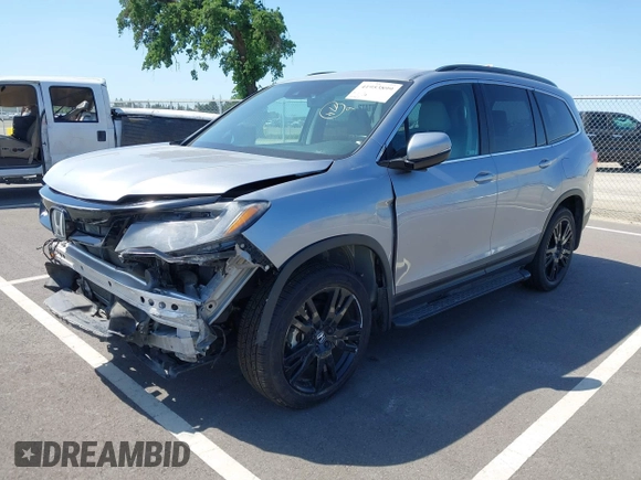 2021 Honda Pilot Special Edition with VIN 5FNYF6H27MB094704, listed as a IAAI auction lot 41953899 with 55,462 mi miles and . Bid and sale history available at DreamBid. Image 2.