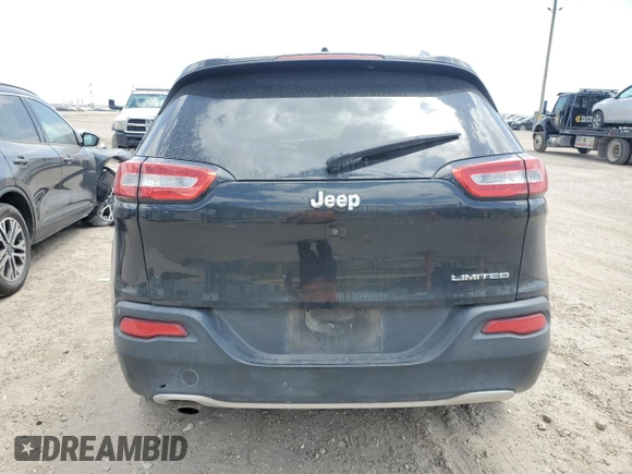 2016 Jeep Cherokee Limited with VIN 1C4PJLDB0GW287372, listed as a Copart auction lot 52795535 with 173,038 mi miles and Salvage title. Bid and sale history available at DreamBid. Image 6.
