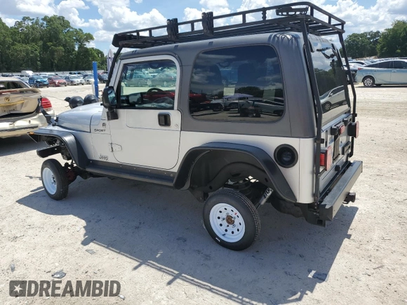 2005 Jeep Wrangler Sport z VIN 1J4FA49S75P324462, wystawiony jako Copart lot #59818995 z przebiegiem 183 558 mil mil oraz Nie do naprawy • Non repairable. Historia ofert i sprzedaży dostępna na DreamBid. Obrazek 2.