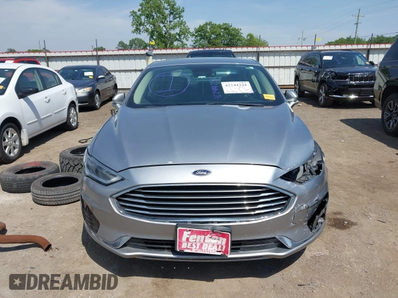 2020 Ford Fusion SEL with VIN 3FA6P0CDXLR196124, listed as a IAAI auction lot 42244231 with 99,306 mi miles and . Bid and sale history available at DreamBid. Image 13.