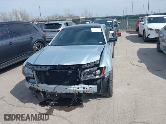 2013 Chrysler 300 with VIN 2C3CCAGT9DH590053, listed as a IAAI auction lot 41800253 with 136,596 mi miles. Bid and sale history available at carsss.com. Image 12.
